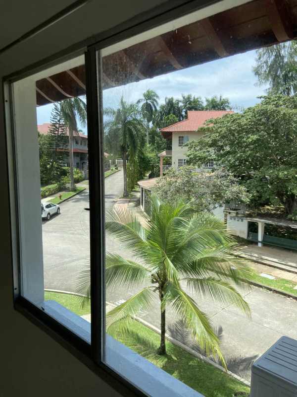 Spacious living area with split AC, tile flooring and big windows at Residencial Albrook Gardens Clayton Panama