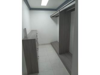 Dining room with table, upholstered chairs in furnished rental in Altos de Panamá