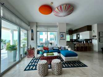 Spacious living and dining room with open kitchen and ocean views in Bijao Panama