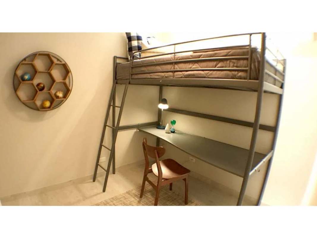 Bright bedroom with large window and neutral tones in PH Bella Natura Los Andes Panama