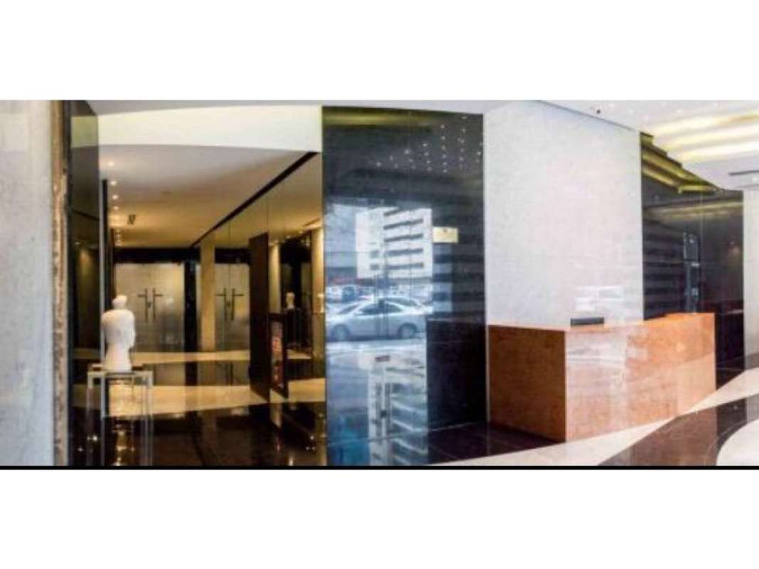 Stylish lobby reception with lighting and reception desk Torre Optima Office Panama City