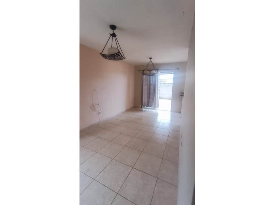 Bright living room with ceramic tiles and window in Arboledas Costa Verde