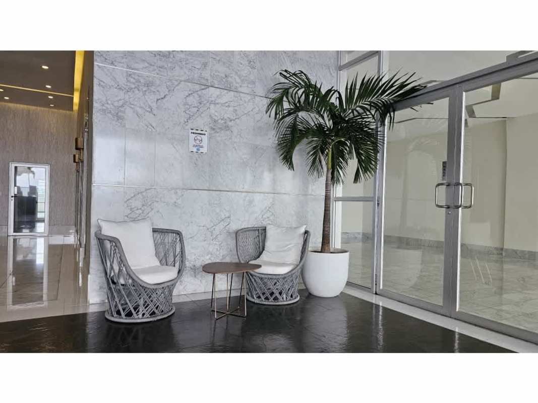 Balcony with glass railing overlooking Pacific Ocean and skyline PH Waters on the Bay Panama