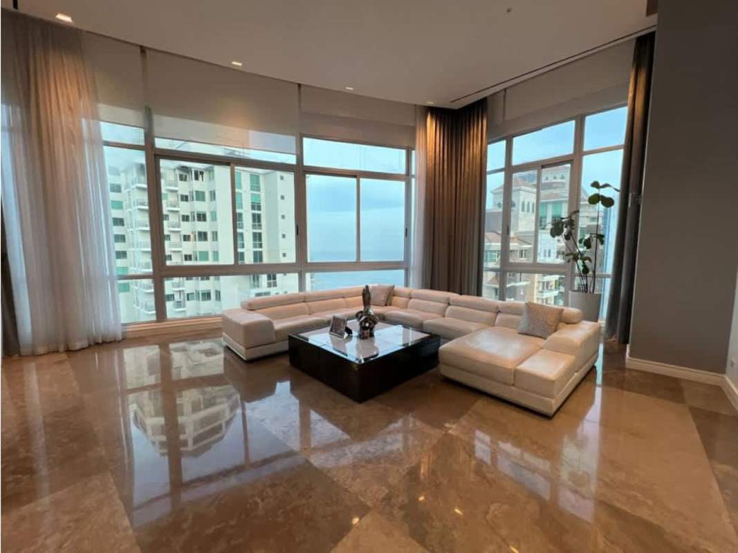 Modern dining area with city and ocean views in luxury penthouse Ocean Reef Towers Panama