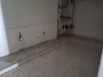 Small interior space with plumbing and ceramic floor inside commercial rental El Dorado Panama City
