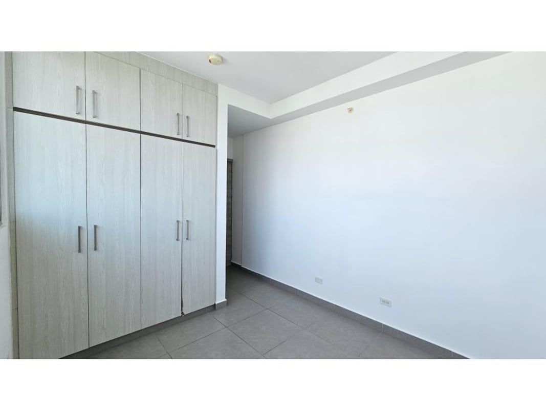 Modern bathroom with glass shower enclosure, contemporary vanity and gray tiles in PH Signature Point Panama