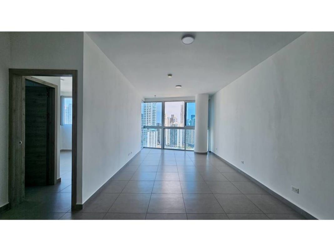Modern kitchen with granite countertops, gray backsplash, stove and refrigerator in PH Signature Point