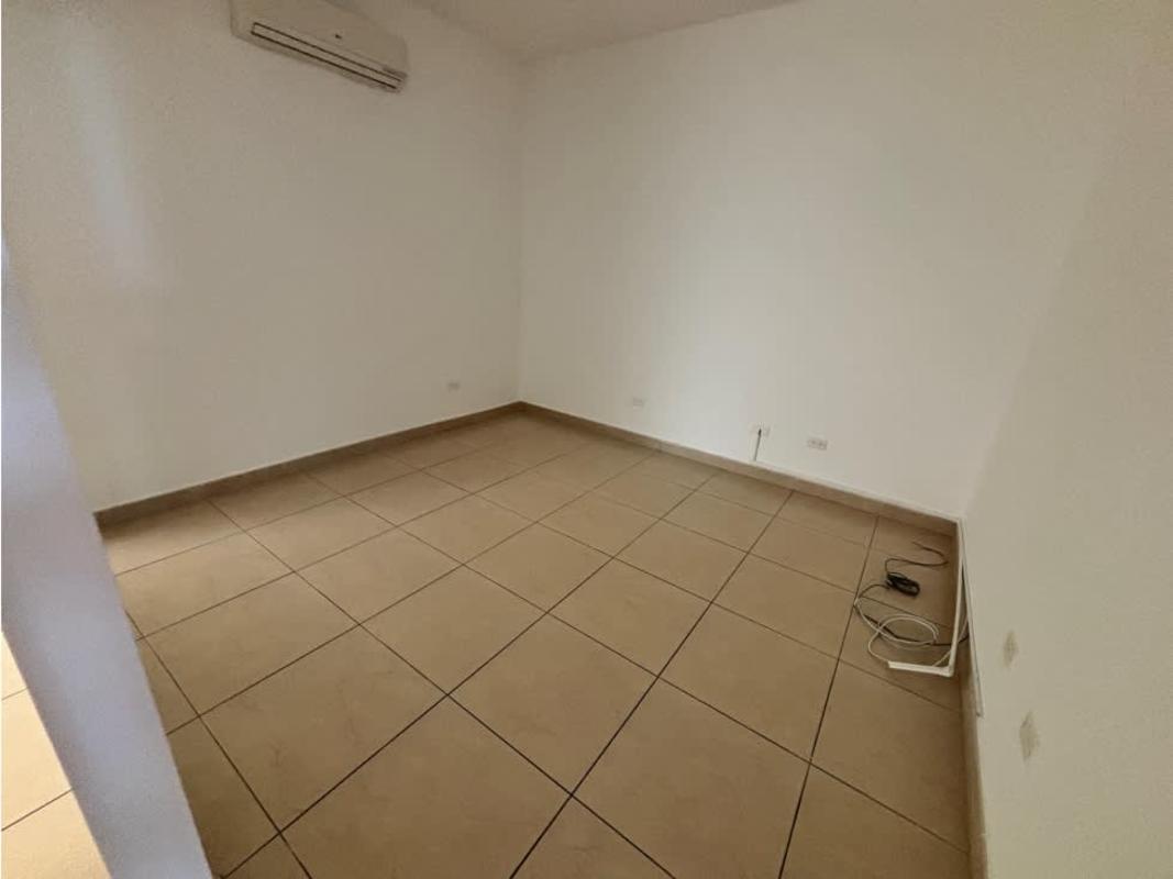 Modern bathroom with glass-enclosed shower and vanity at PH White Panama City