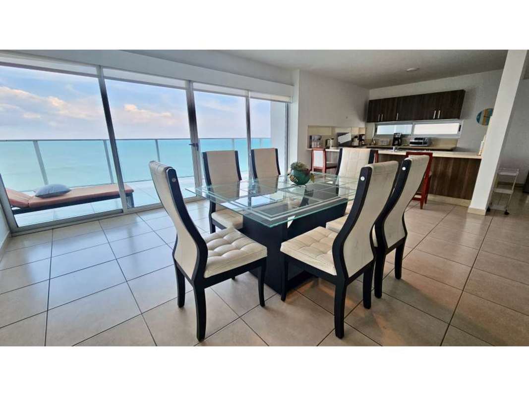 Fully equipped kitchen with appliances, wooden cabinets, breakfast bar Punta Pacifica Panama