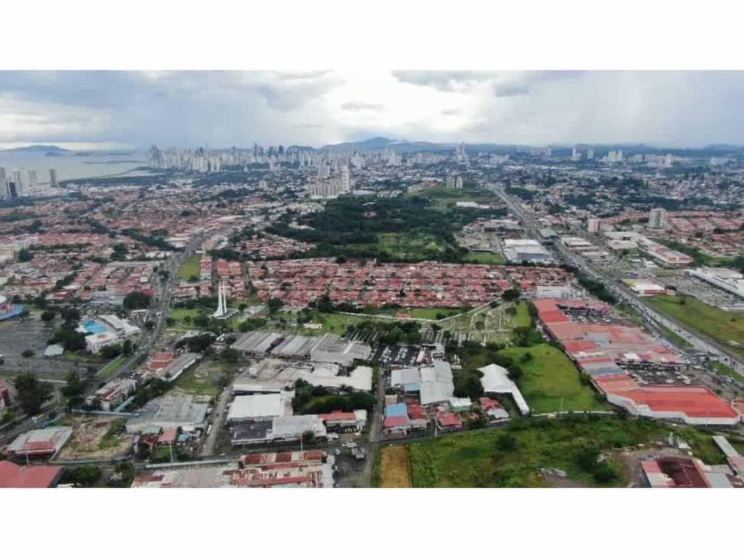 Aerial panoramic shot showing Panama City skyline, commercial zones and Juan Díaz development site