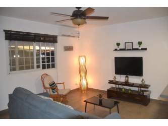 Compact modern bathroom glass shower and pedestal sink in PH Maja Penonomé Panama