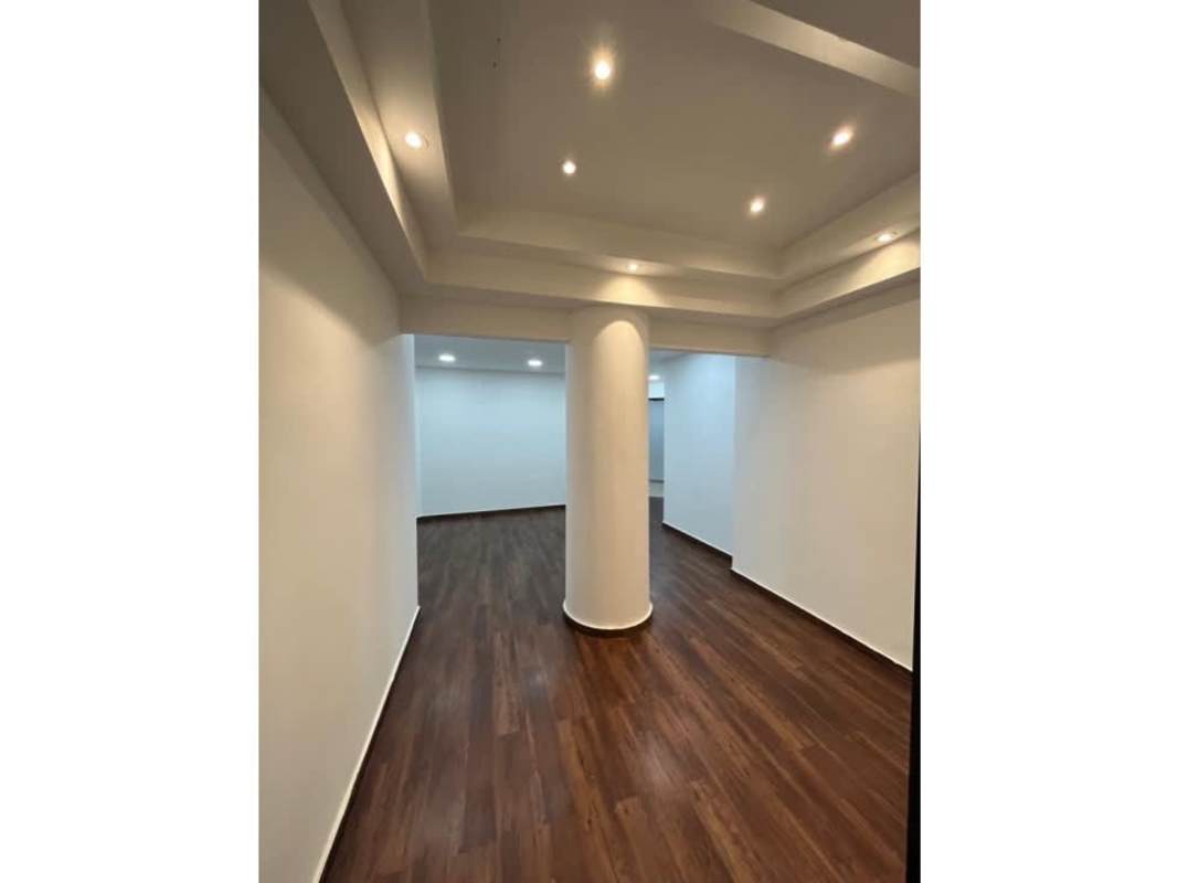 Reception lobby with wood floors in premium Avenida Balboa office Panama City