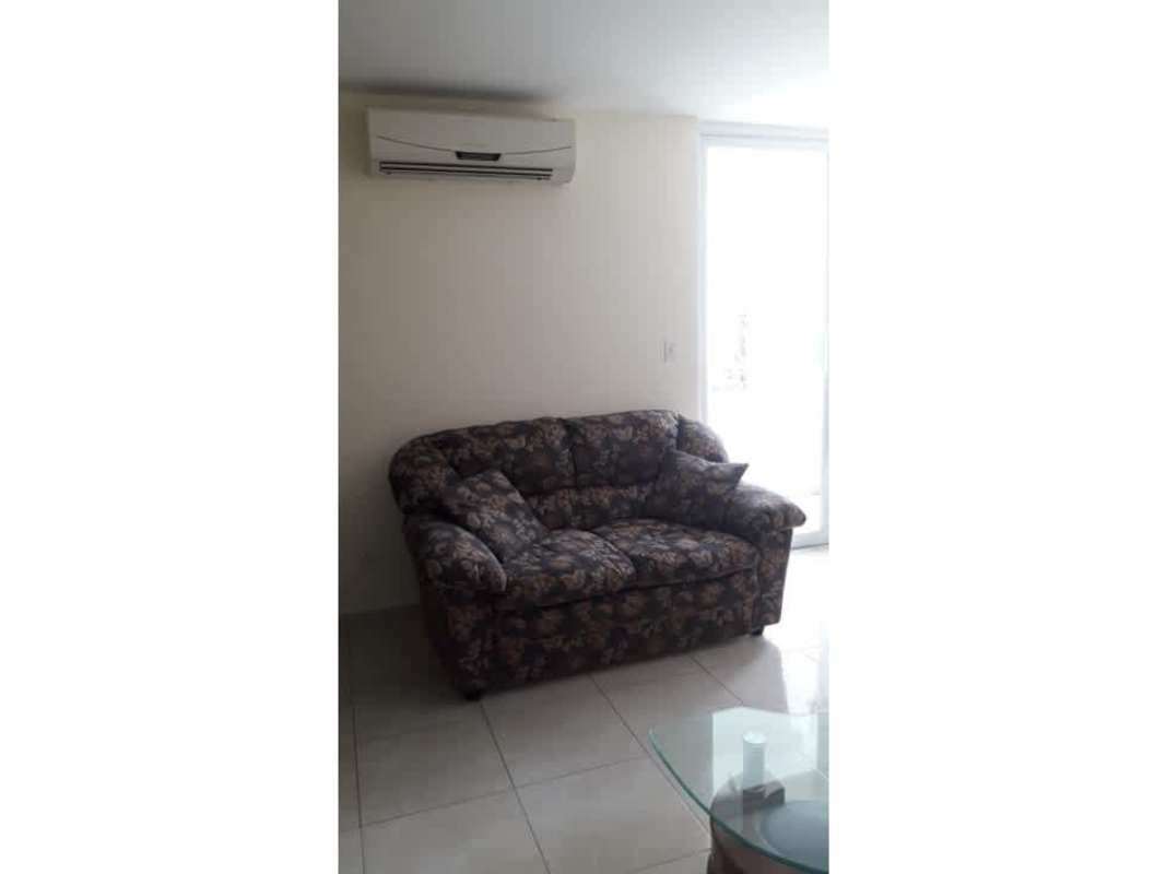 Covered balcony with railing and city view at PH Edison Park Betania Panama