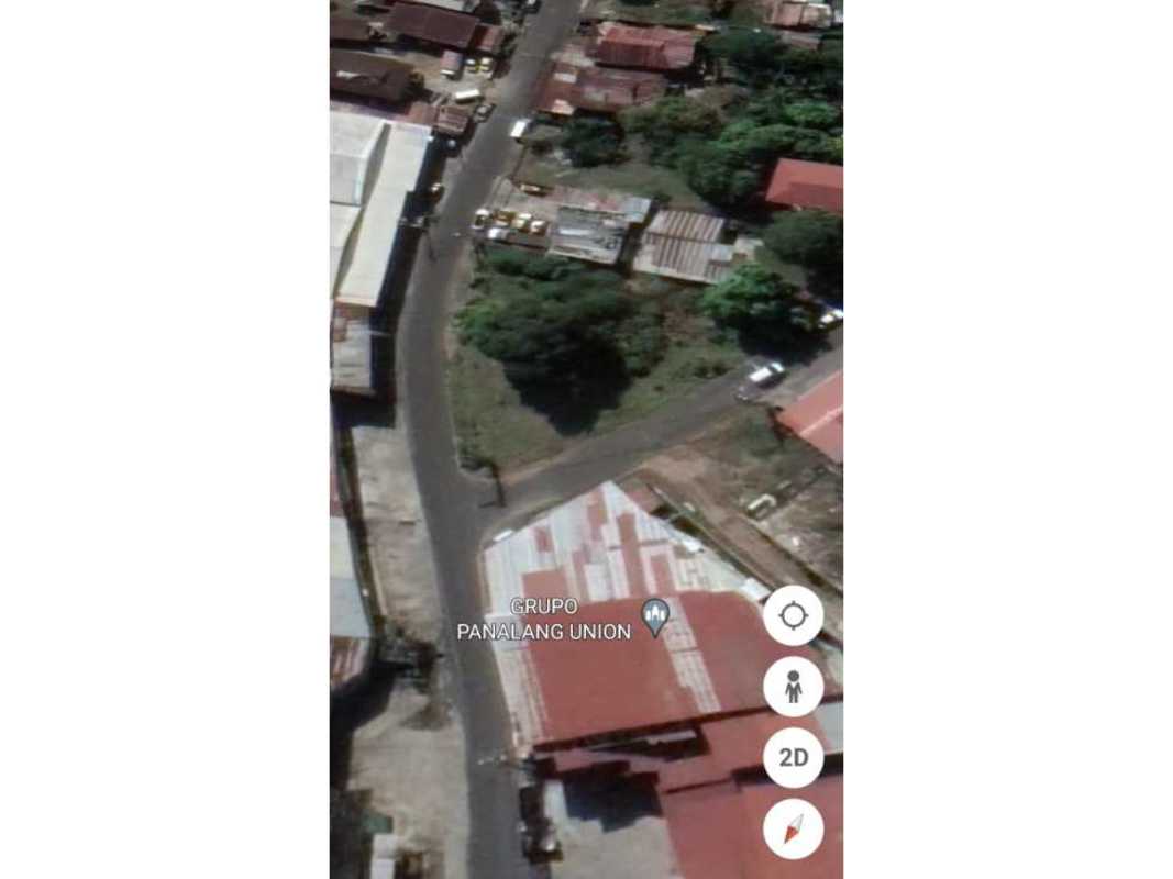 Aerial urban overview showing neighborhood layout and main roads near Rio Abajo Panama development land