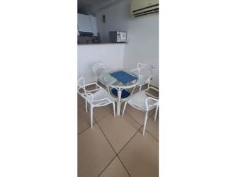 Bathroom with glass shower enclosure and white vanity at PH El Palmar beachfront building in San Carlos Panama