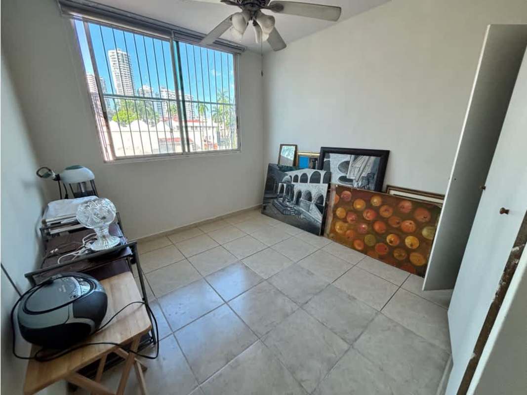 Bedroom with closet ceiling fan large window city views PH Palma de Bella Vista Panama City