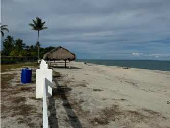 Private sandy path leading to white sand Playa Blanca beach just steps away from Sol y Mar community
