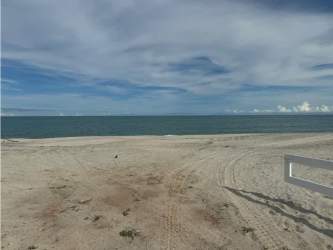 Sandy quiet Pacific beachfront near Playa Blanca perfect for sunsets and recreation