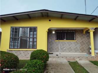 Front porch and garden in fenced single-level house Parques del Oeste Arraijan Panama
