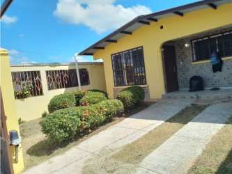 Bedroom with wooden closet and natural light in gated house Parques del Oeste Arraijan Panama