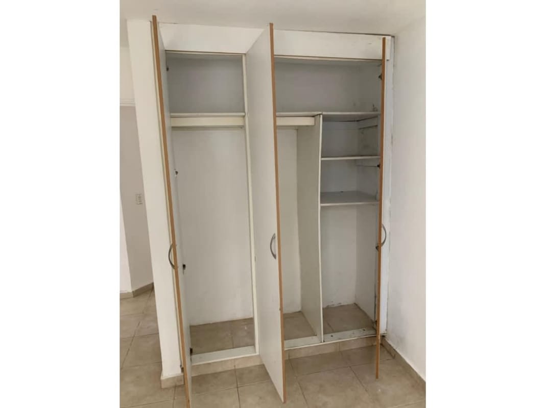 Modern bathroom with tiled walls, pedestal sink, and shower at PH San Francisco Bay