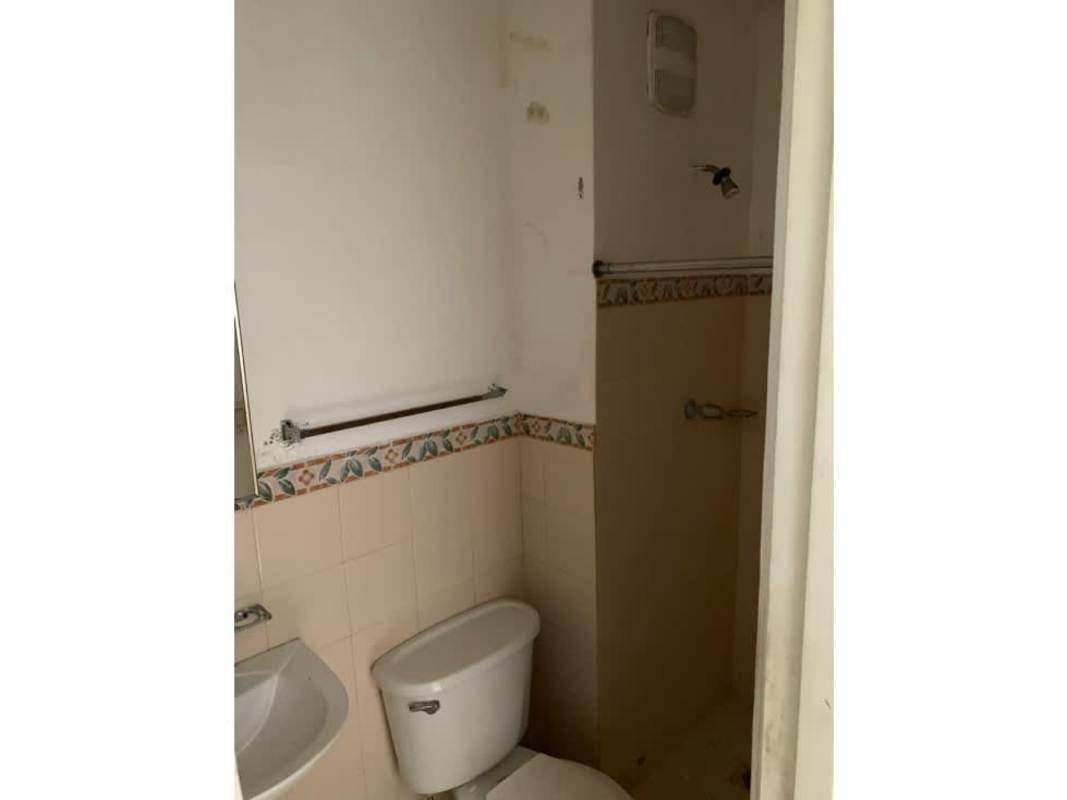 Kitchen with granite countertops and wood cabinets in PH San Francisco Bay Panama City