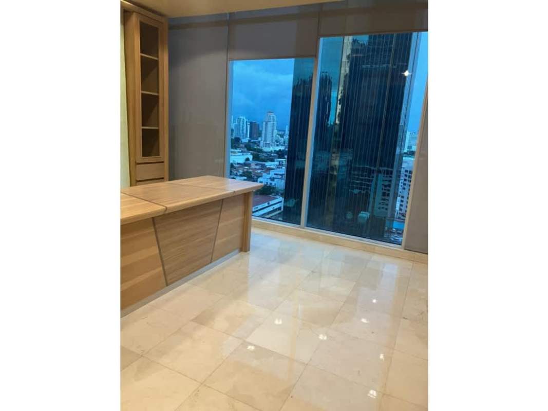 Executive meeting room with glass walls and modern furnishings in Torre Global Panama