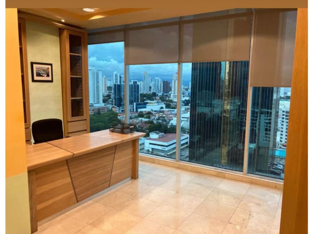 Open cubicle workspace with ergonomic chairs at Torre Global Panama for rent