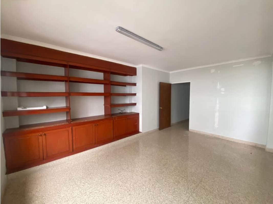 Entrance to office space with white walls and tile flooring Vía Argentina Panama City