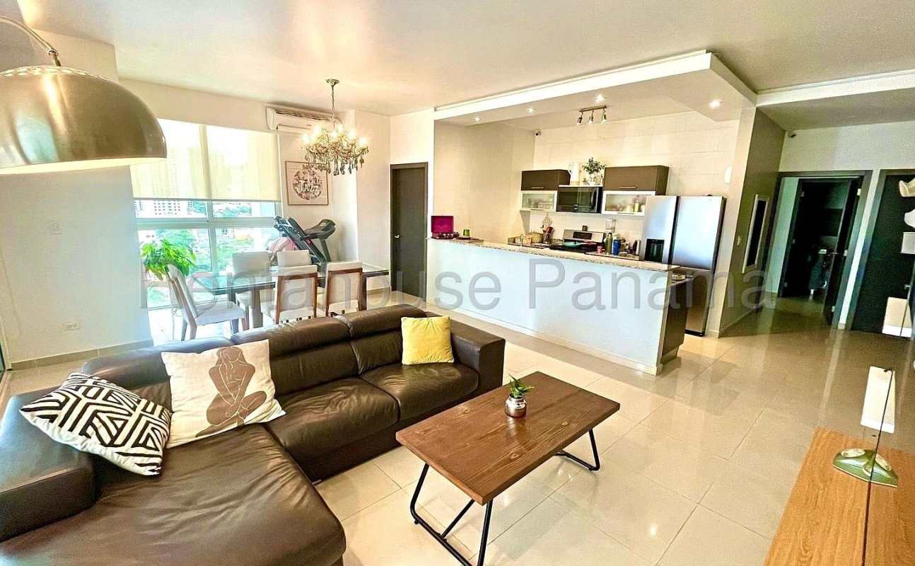 Spacious dining and living area with balcony access PH Coco Village San Francisco Panama