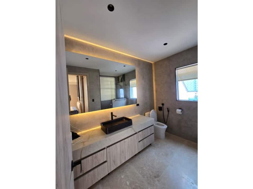 Open plan living dining with balcony and sea view at PH Q Tower Punta Pacifica Panama