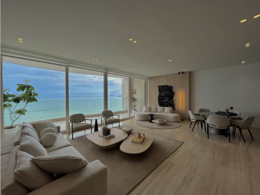 Modern dining open living with city and ocean views furnished apartment PH The Towers