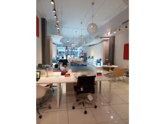 Large open commercial office with bright windows, tile flooring and modern lighting in PH Obarrio Plaza Panama