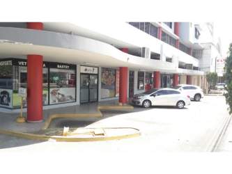 Multi-level parking with red accents at PH Milano El Dorado Panama