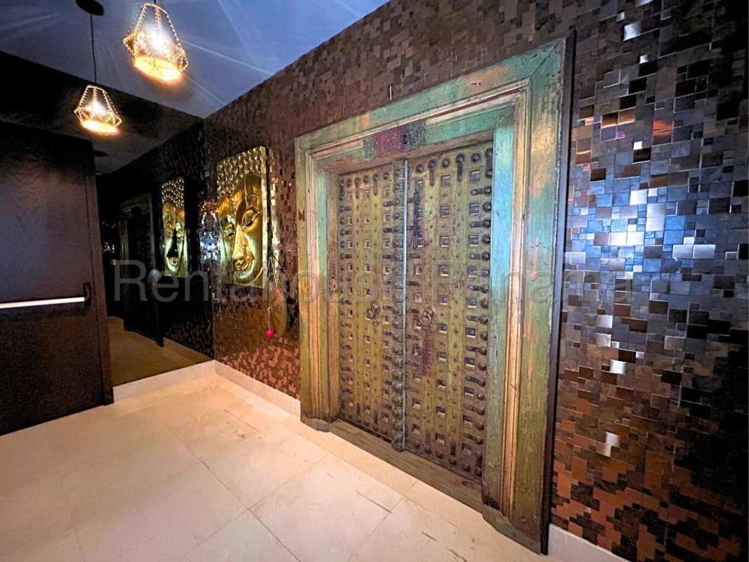 Large walk-in closet with custom cabinetry in PH Marea 2 Costa del Este Panama