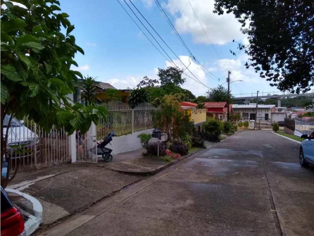 Gated tropical family homes along quiet street Villa Lucre Panama