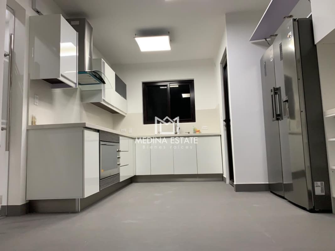 Spacious master bedroom with private balcony overlooking forest Embassy Village Panama