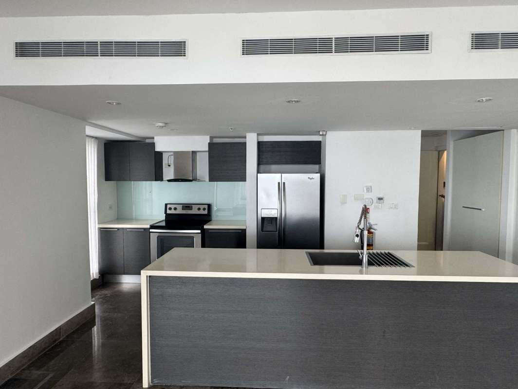 Fully equipped modern fitness center overlooking ocean at PH YOO Panama