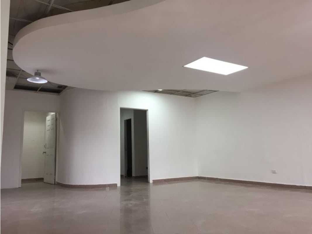 Unfinished tile floor office with drop ceiling and white walls PH Kitaen Bella Vista