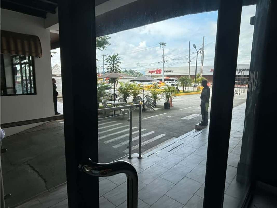 Interior retail or office space with floor tiles and glass doors Las Cumbres Panama