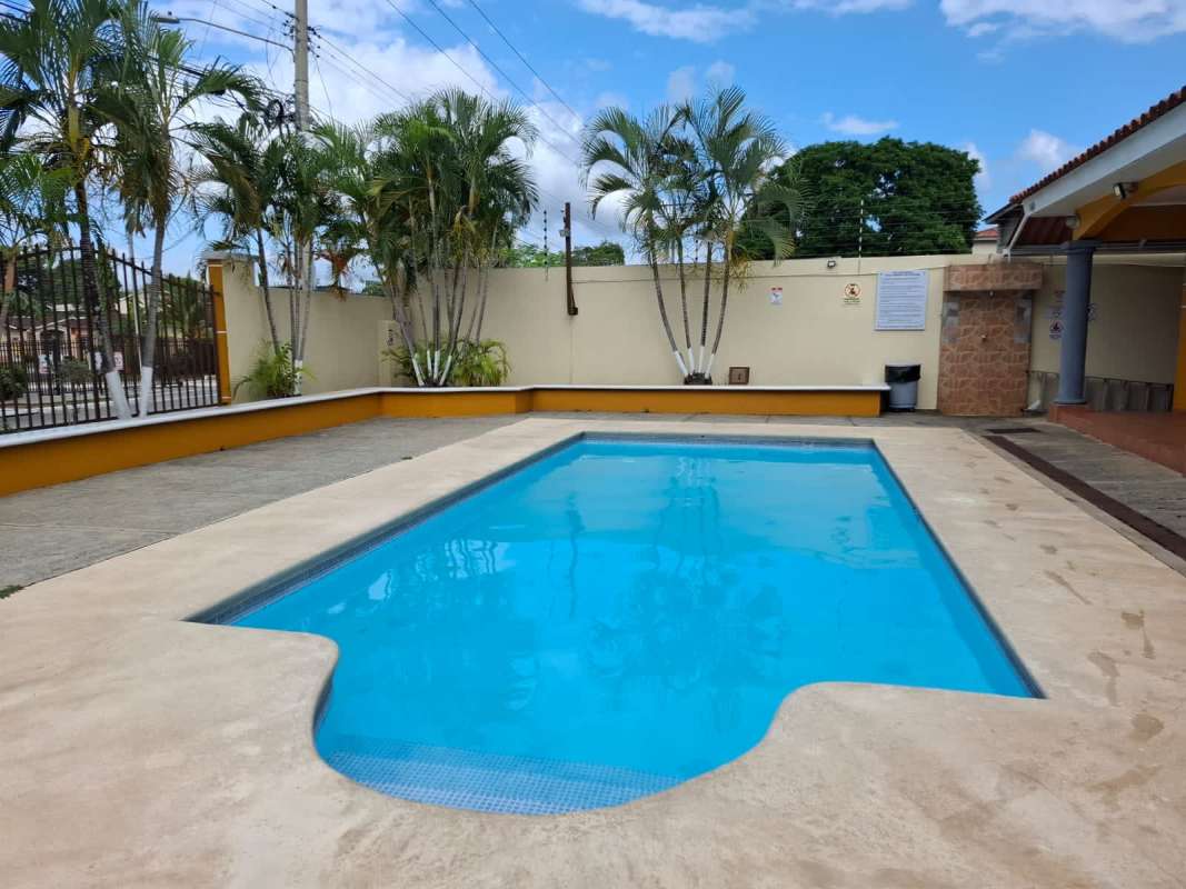 Swimming pool with sun deck and surrounding garden area in PH Cantabria Las Acacias Panama