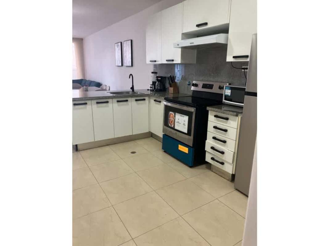 Modern kitchen with stainless appliances and cabinets PH White Tower Panama