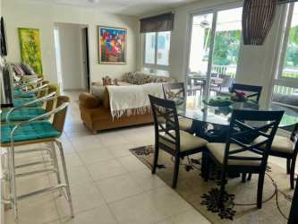 Spacious master bedroom with AC split, full closet, window view in Bijao Beach condo Panama