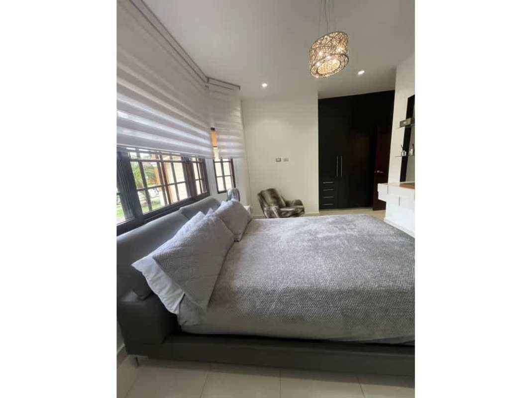 Contemporary open living and dining area luxury home Sunset Coast Costa Sur