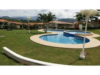 Shaded terrace with garden in furnished beach rental Coronado Panama