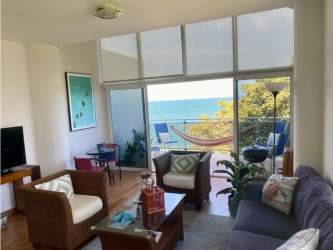 Open concept kitchen dining space balcony oceanview Farallón Panama