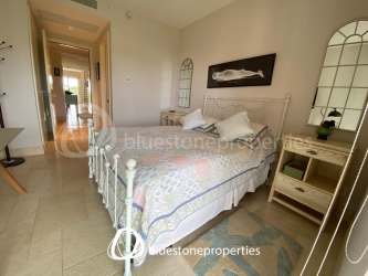 Bright bedroom with ensuite bath modern tile and large windows luxury Panama Buenaventura