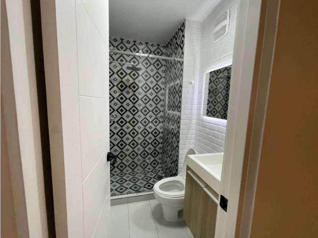 Bathroom with geometric tile shower, glass door, backlit mirror modern finishings PH Montemar San Francisco