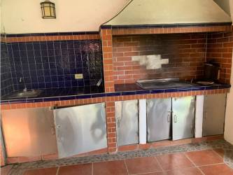 Bathroom with tiled walk-in shower and vanity sink in Coronado 4BR house for sale Panama