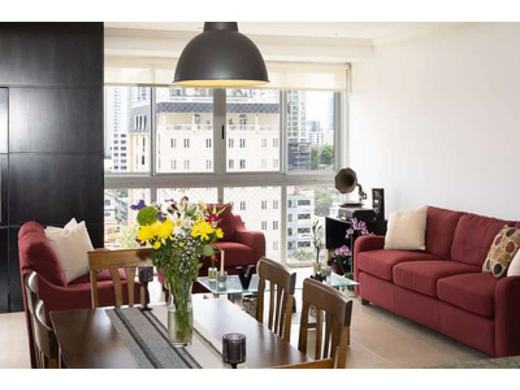 L-shaped kitchen with granite countertops, wooden cabinets PH Fairmont Plaza Panama